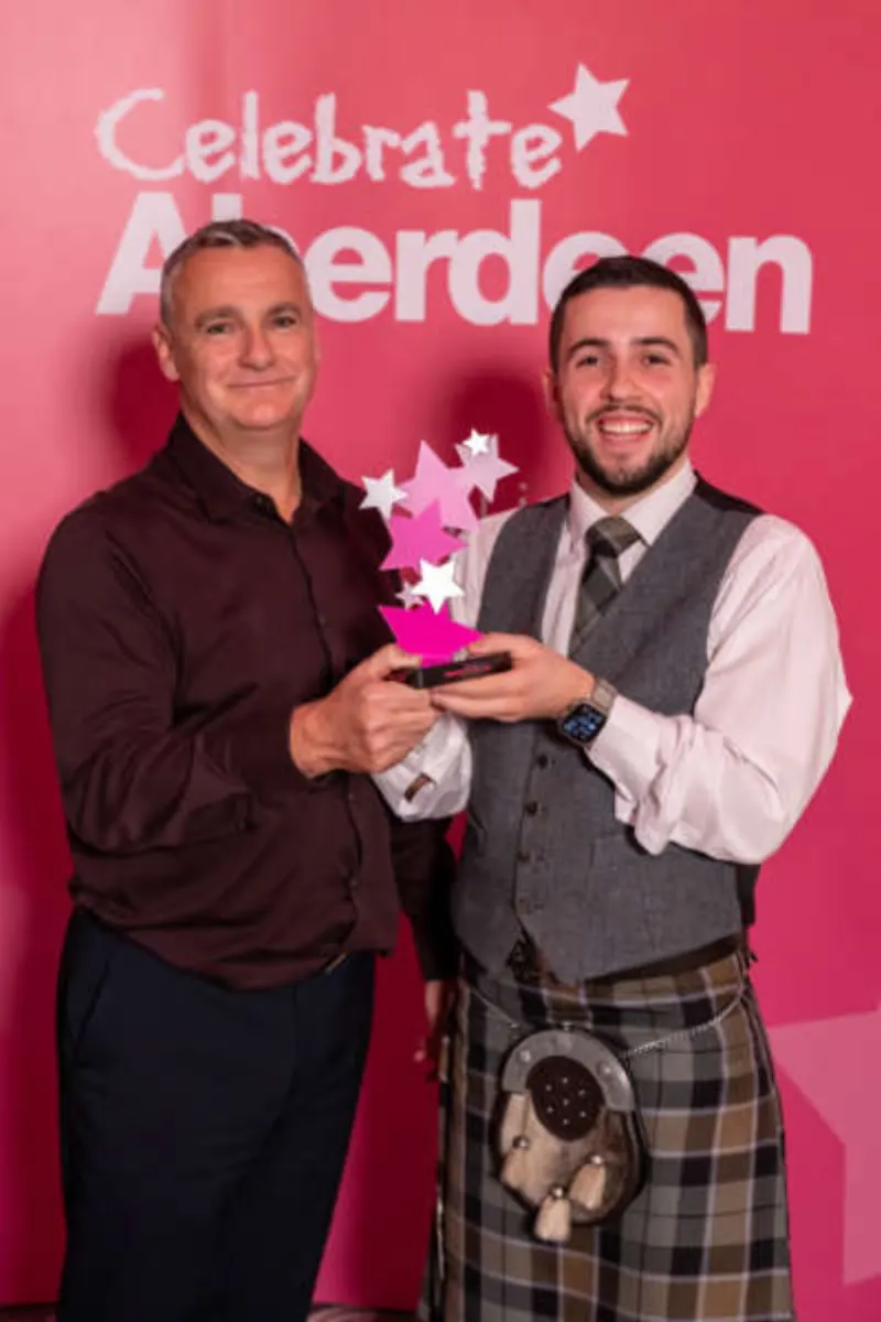 Volunteer of the Year: Kris Davidson, Befriend A Child (right), with Andrew Williamson, CNR International